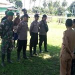 BABINSA DAN BHABINKAMTIBMAS OKABA LAKUKAN APEL PERSIAPAN PATROLI PENGAMANAN PERGANTIAN TAHUN