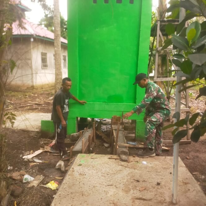 
					TMMD ke-123, Personel Kodim 0314/Inhil Laksanakan Pembersihan Sisa Material Pembangunan MCK