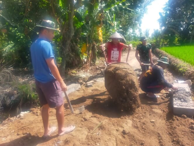 
					Satgas TMMD dan Warga Desa Bagu Lakukan Pengurukan Jalan Baru Secara Gotong Royong