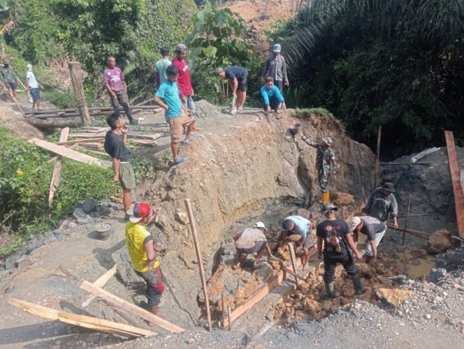 
					Masuk Pekan Kedua, Satgas TMMD Kebut Pembuatan Pondasi Jembatan Kolombi