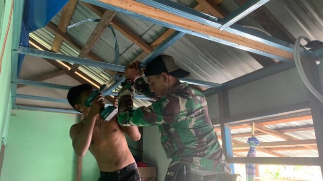 
					Satgas TMMD Rehab Rumah Ibu Hamni di Desa Talio