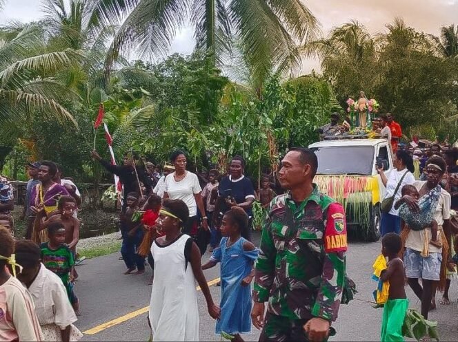 
					Momen Satgas TMMD Ikut Meriahkan Kegiatan Arak-Arakan Bunda Maria, Bukti Keharmonisan TNI dan Warga