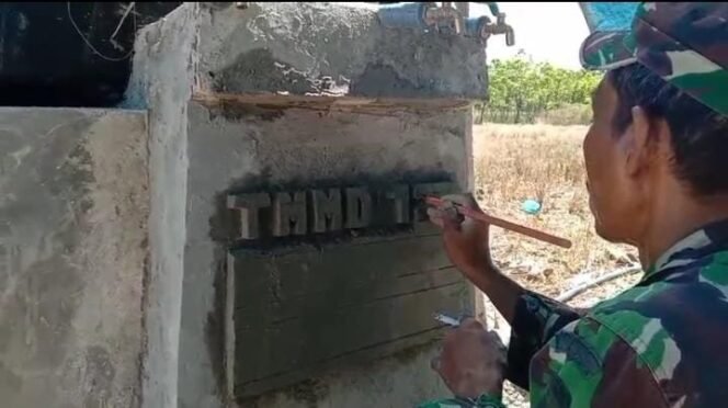 
					Tulisan TMMD Ke-124 Hiasi Sumur Bor Baru Onensila