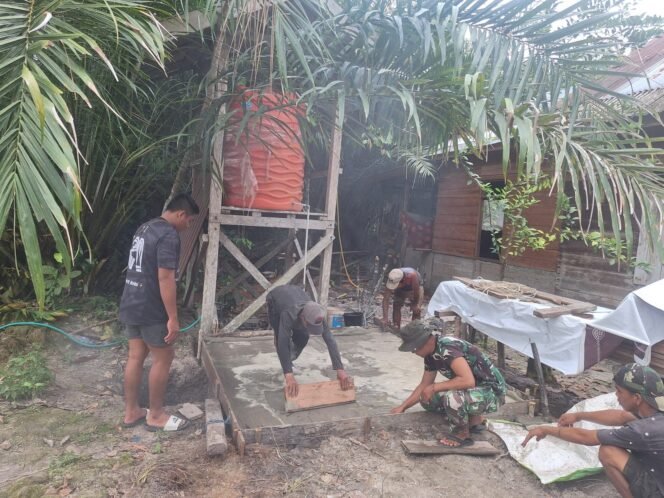 
					TMMD Ke-124: Satgas Kodim 1012/Buntok Finalisasi Fasilitas Sumur Bor dengan Pengecoran Lantai Toren