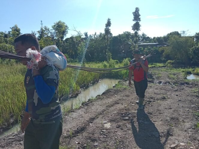 
					Tuntas 100 Persen! Satgas TMMD Kodim 1620/Loteng Rampungkan Pembangunan Tembok TPU di Desa Puyung