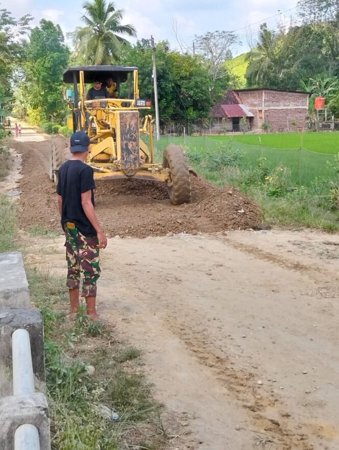 
					Kolaborasi Alat Berat dan Satgas TMMD, Jalan Desa Garuda Mulai Berubah Wajah