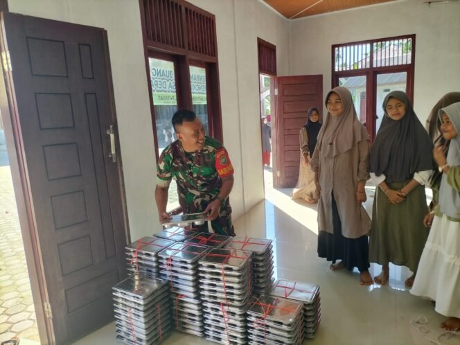 
					Kodim Aceh Jaya Tingkatkan Gizi Anak Melalui Program Makan Bergizi Gratis di Desa Ladang Baro