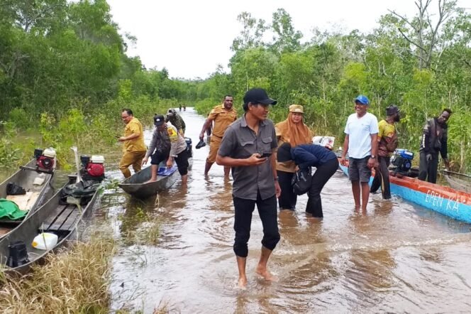 
					Solidaritas di Tengah Bencana; Pemerintah, TNI dan Polri Bersatu Ringankan Beban Warga Rawa Biru