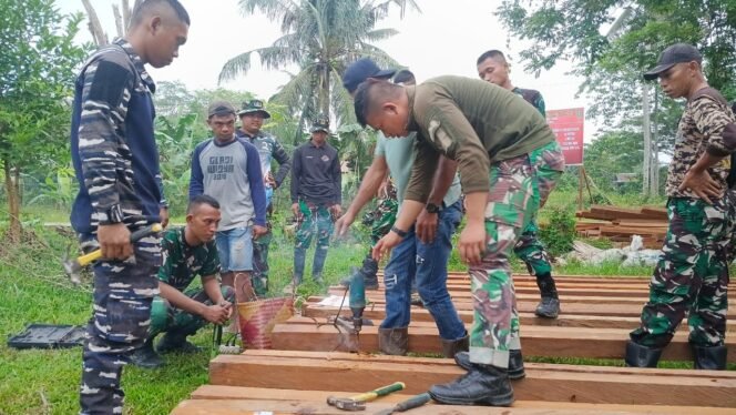 
					Dari Kayu ke Kepercayaan: Pembangunan Jembatan TMMD Kodim 0909/Kutai Timur