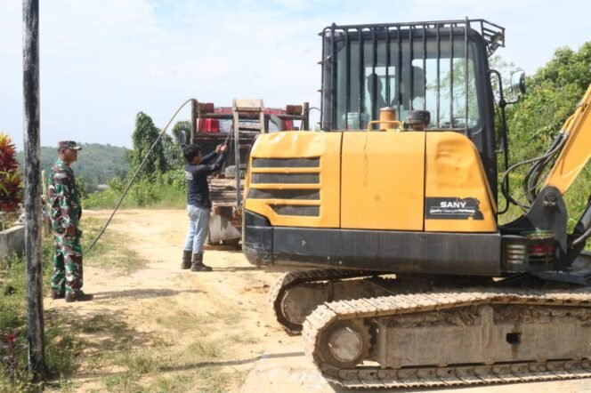 
Mesin Tempur TMMD: Ekskavator Hadir untuk Akselerasi Pembangunan Jalan