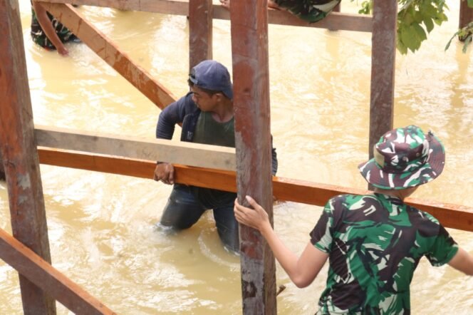 
					TMMD Ke-125 Kodim 0909/Kutai Timur: Aksi Nyata TNI Selesaikan Jembatan Ulin di Kutai Timur