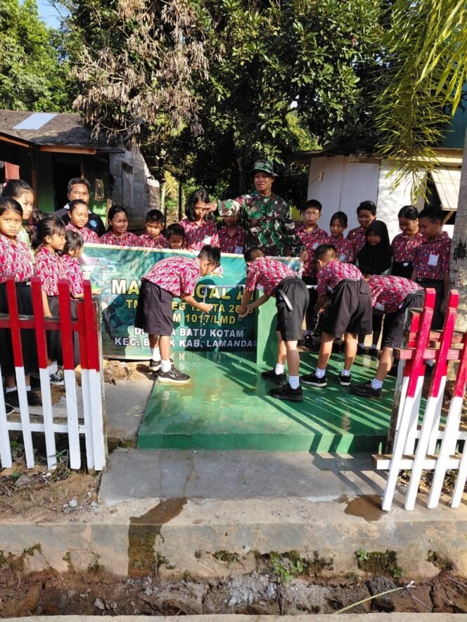 
					Senyum Anak-anak SD Negeri Batu Kotam Sambut Sumur Bor TMMD Reguler ke-125