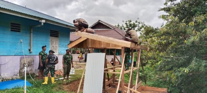
					Satgas TMMD 126 Kodim 1711/BVD Genjot Pemasangan Atap MCK, Kejar Target Penyelesaian di Waropko