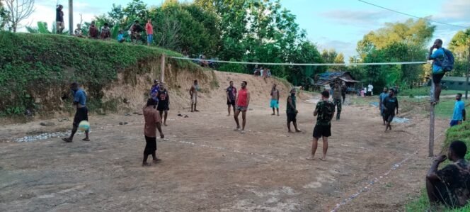 
					Melalui Olahraga, Satgas TMMD Ke-126 dan Warga Waropko Perkuat Kemanunggalan TNI-Rakyat