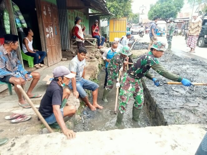 
					Danramil 04/Woha Bersama Muspika Kecamatan Belo Gelar Gotong Royong Bersihkan Desa Ngali