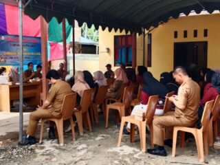 Babinsa Koramil Lampihong Dampingi Musdes Penataan Posyandu