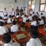 Pjs Danramil Ruteng Hadiri Launching Program Makanan Bergizi di SMPN 2 Ruteng