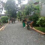 Sinergi TNI-Polri dan Warga, Pengerasan Jalan di Sukmajaya Terus Dikebut