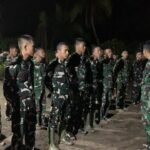 Pastikan Kesiapsiagaan, Satgas TMMD Laksanakan Apel Malam dan Cek Personel