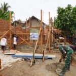 RTLH TMMD Kodim 0421/LS di Desa Tanjung Rejo Masuki Tahap Pemasangan Batu Bata dan Kusen