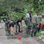 Gotong Royong Satgas TMMD dan Warga Percepat Pembangunan Jalan dan Talud Desa Oyom