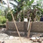 Satgas TMMD Kodim 1305/BT Bersama Warga Pasang Batako Pembangunan MCK di Desa Oyom