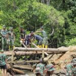 Sinergi TNI AD, AL dan Komcad, TMMD 127 Kodim 1804/Kaimana Perbaiki Jalan dan Jembatan Kampung Marsi