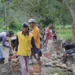 Satgas TMMD 127 Kodim 1305/Buol Tolitoli Laksanakan Pengerasan Jalan dan Pembangunan Talud di Dusun Ogomolobu