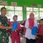 BABINSA KODIM 1420/SIDRAP PENDAMPINGI DISTRIBUSI MAKAN BERGIZI GRATIS