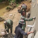 Satgas TMMD 127 Kebuth Finishing Talud, Plaster Dinding Dikebut di Kendari