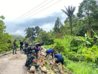 Satgas TMMD 127 Kodim 1305/Buol Tolitoli Laksanakan Pengerasan Jalan dan Pembangunan Talud di Dusun Ogomolobu