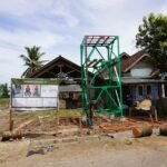 TMMD ke-127 Kodim 0421/LS: Pemasangan Tiang Tower di Titik Sumur Bor Desa Tanjung Rejo