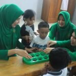 Persit Kartika Chandra Kirana Kodim 0909/Kutai Timur Meriahkan Permainan Tradisional