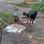 Kebersamaan TNI dan Warga Wujudkan Infrastruktur Lebih Baik di Anjir Pasar Kota