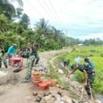 Kebersamaan Satgas TMMD Kodim 1305/BT Bangun Talud 1.030 Meter di Dusun Ogomolobu