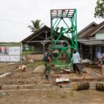 TMMD ke-127: Pemasangan Tiang Tower Sumur Bor Desa Tanjung Rejo