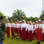 Satgas TMMD ke-127 Tanamkan Disiplin Lewat Latihan PBB di SD Desa Tri Buana
