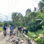 Satgas TMMD ke-127 Kodim 1305/Buol Tolitoli Laksanakan Pengerasan Jalan dan Pembangunan Talud di Dusun Ogomolobu