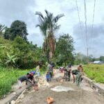 Satgas TMMD ke-127 Kodim 1305/Buol Tolitoli Laksanakan Pengerasan Jalan dan Pembangunan Talud di Dusun Ogomolobu