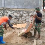 Satgas TMMD 127 Percepat Pemelesteran Dinding MCK di Gereja Pelita Kasih