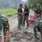 Satgas TMMD ke-127 Kodim 1305/BT Kebut Pengerasan Jalan 650 x 4 Meter di Dusun Ogomolobu