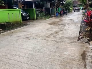 TMMD 127 Depok: Pengerasan Jalan Gardenia Rampung 100% Meski Diguyur Hujan