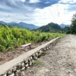 Infrastruktur Jalan di Desa Oyom Rampung, Pengerasan Jalan dan Talud Capai 100 Persen