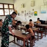 Pastikan Lancar, Babinsa Desa Undisan Kawal Pendistribusian MBG di Sekolah
