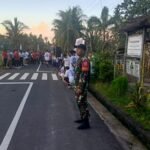 Jalan Santai HUT Ke 41 STT Eka Panji, Babinsa Paksebali Bersama Bhabinkamtibmas Gelar Pengamanan