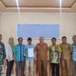 Babinsa Koramil 1005-05 Mandastana Hadiri Rapat Pembentukan Panitia Pilkades Desa Karang Bunga