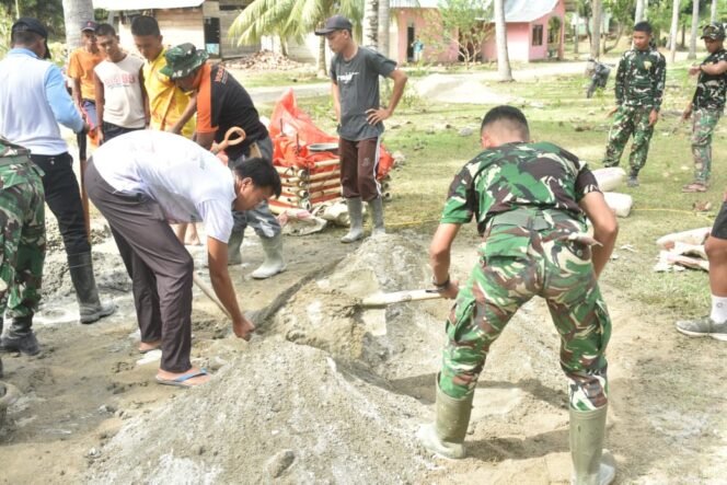 
					Deru Cangkul dan Semangat Warga Warnai Pembangunan Jalan Desa Boalemo