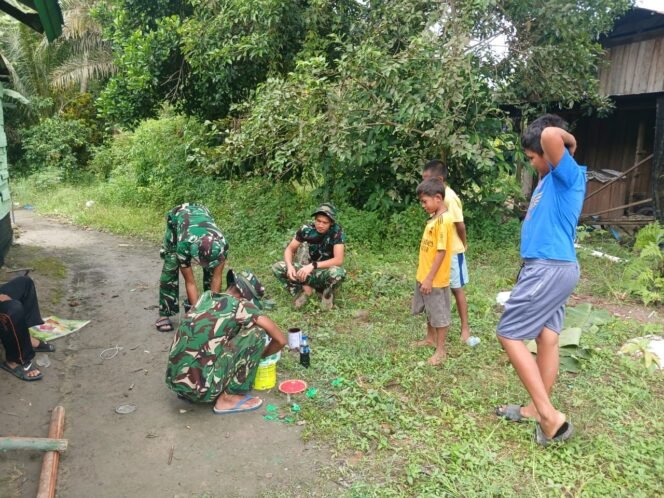 
					Rasa Penasaran Anak-Anak Warnai Kegiatan TMMD Ke-128 di Sungai Hijau